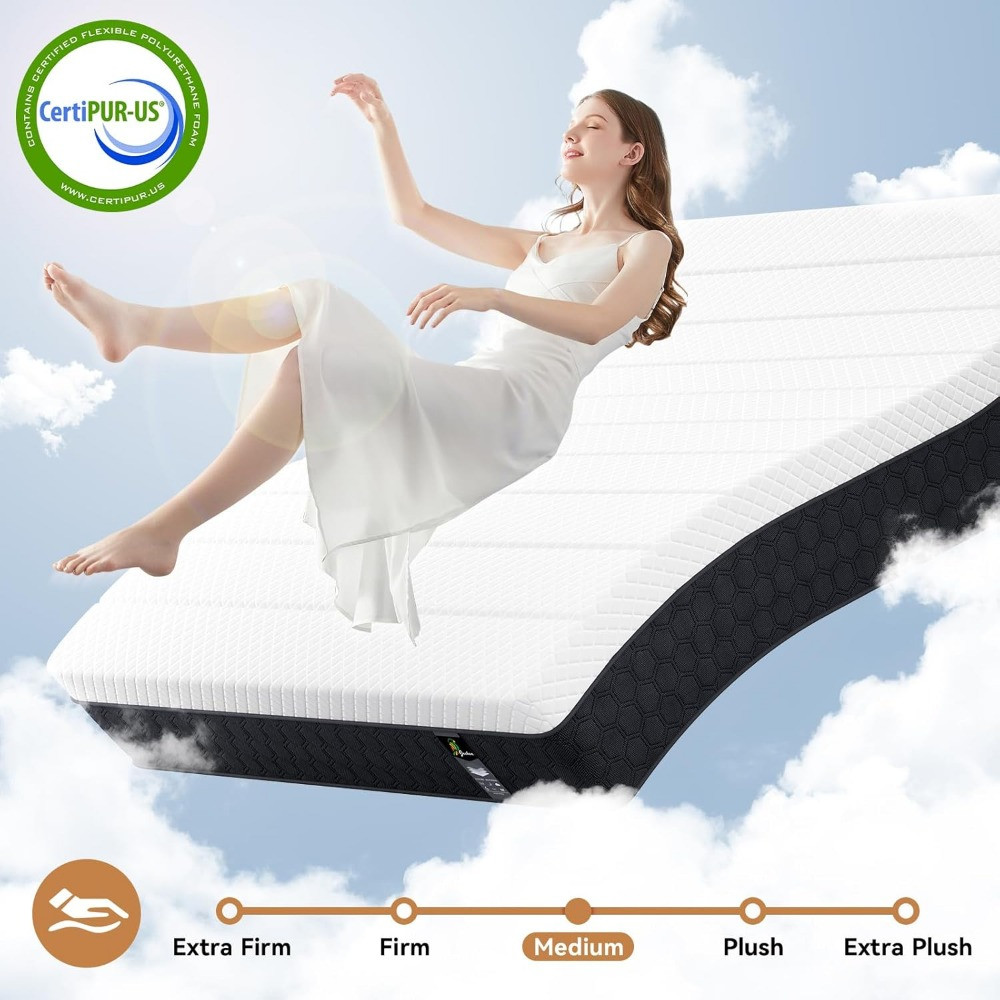 Woman lounging above a mattress with cloud background